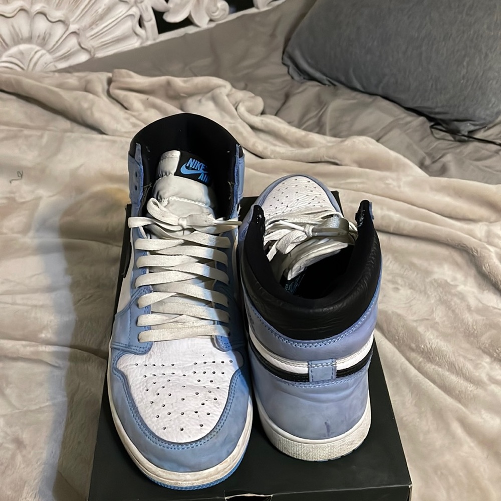 Blue and white Jordan 1s
